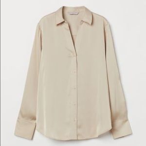 V-neck blouse in woven fabric with a sheen. H and M size XS